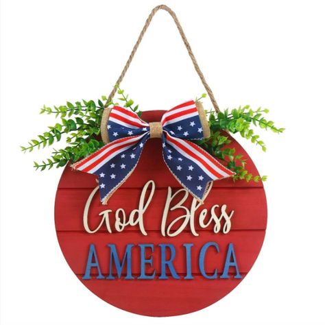 This patriotic wreath is designed in a round shape, red wood board, white and blue letters "God Bless AMERICA", which is in line with the patriotic theme and full of festive atmosphere. The patriotic bow is perfectly combined with the lifelike leaves, the thick rope makes it easy to hang it on the front door, and will bring the spirit of freedom in your 4th of July or any patriotic parties, just show off your American spirit! Patriotic Wreaths For Front Door, God Bless America Sign, Independence Day Theme, Patriotic Door Hanger, Patriotic Wreaths, America Sign, Memorial Day Wreaths, Blue Letters, America Decor