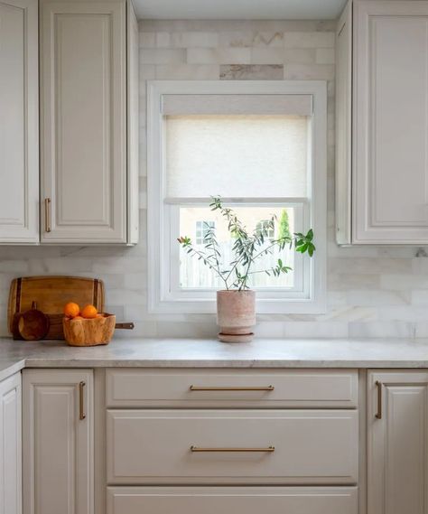 Timeless kitchen cabinet colors – 7 endlessly classic shades | Painted Vanilla Kitchen Cabinets, Cream Kitchen Cabinet Colors, Neutral Cabinet Colors Kitchen, Kitchen Cabinets Timeless, Timeless Kitchen Paint Colors, Simple Classic Kitchen Design, Cabinet Color With White Dove Walls, Classic Cabinet Colors, Cabinets Around Window Kitchen