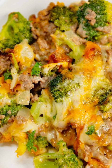 Ground Beef and Broccoli Casserole is a hearty dish loaded with ground beef, broccoli florets, diced onions, alfredo sauce, Italian seasoning, mozzarella cheese and cheddar cheese. Ground Beef And Broccoli Casserole, Beef And Broccoli Casserole, Ground Beef And Broccoli, Cheesy Broccoli Casserole, Healthy Low Fat Recipes, Ground Beef Casserole Recipes, Broccoli Cheese Casserole, Beef Broccoli, Low Carb Low Fat Recipes