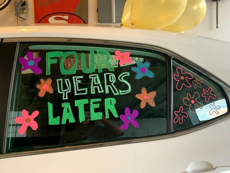 Four years later - senior car decor Graduating Car Decoration, Grad Car Decor Ideas, Rondo Car Ideas, Graduation Car Paint, Car Chalk Window Ideas Senior, Graduate Car Decoration, Senior Parade Car Decoration, Senior Car Paint Ideas 2020, Grad Car Decor