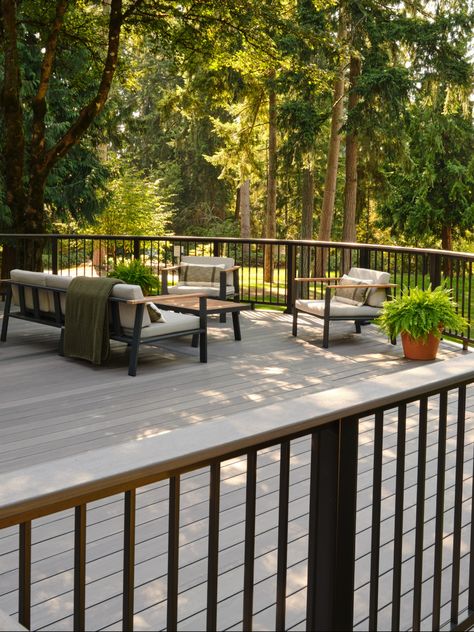 Add both elegance and utility to your deck with a drink rail, compatible with our Impression Rail Express and Classic Composite Series. Discover the difference it makes for your entire space. Deck Drink Rail, Timber Tech Deck Ideas, Drink Rail, Under Deck Drainage, Deck For Entertaining, Timbertech Decking, Deck Railing Ideas, Pvc Decking, Black Deck