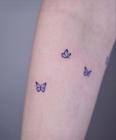 Purple Tattoo Ink, Small Hip Tattoos Women, Purple Butterfly Tattoo, Pisces Tattoo Designs, Ring Tattoo Designs, Blue Butterfly Tattoo, Purple Tattoos, Hip Tattoos, Small Butterfly Tattoo