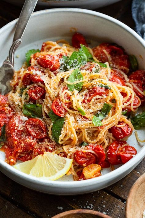 If you're looking to add to your options for weeknight dinners, try this easy angel hair pasta recipe! It is loaded with cherry tomatoes bursting with flavor, fresh basil leaves and garlic all topped with parmesan cheese. It's simple and on the table in less than 30 minutes! #angelhairpasta #easydinner #pastarecipe Angel Hair Recipes, Cream Of Mushroom Pasta, Angel Hair Pasta Recipe, Angel Hair Pasta Recipes, Pasta Recipes Video, Oh Sweet Basil, Tomato Basil Pasta, Cherry Tomato Pasta, Butter Pasta