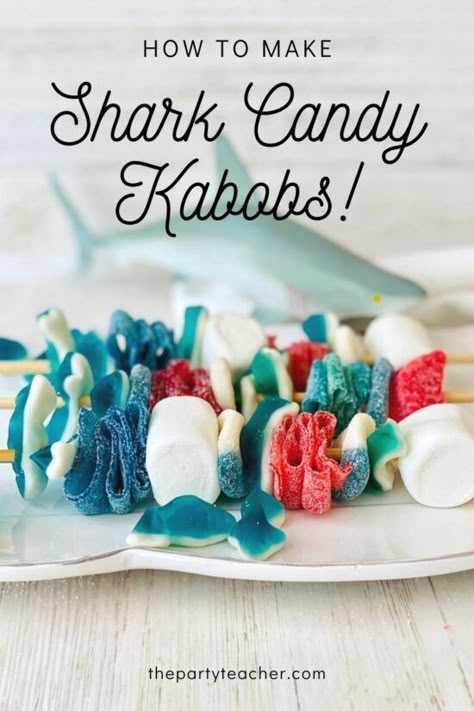 Shark Candy Kabobs, Shark Candy Table Ideas, Shark Themed Party Favors, Shark Week Dessert Ideas, Shark Week Treats, Baby Shark Birthday Party Food, Totally Two-bular Birthday, Surf Party Food, Shark Cuterie Board