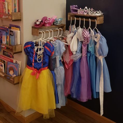 Ikea Spice Rack Dress Up, Dress Up Storage Behind Door, Dress Up Organization Ideas, Dress Up Hanging Rack, Princess Dress Hanging Rack, Small Space Dress Up Storage, Dress Up Wall Ideas, Princess Dress Organization, Playroom Dress Up Area