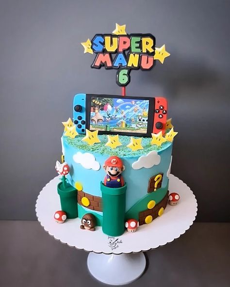 Nintendo switch cake Nintendo Switch Mario Cake, Nintendo Switch Cake Topper, Nintendo Switch Cakes For Boys, Nintendo Switch Cake Ideas, Nintendo Birthday Cake, Nintendo Switch Birthday Cake, Pastel Nintendo Switch, Mario Theme Cake, Nintendo Switch Cake