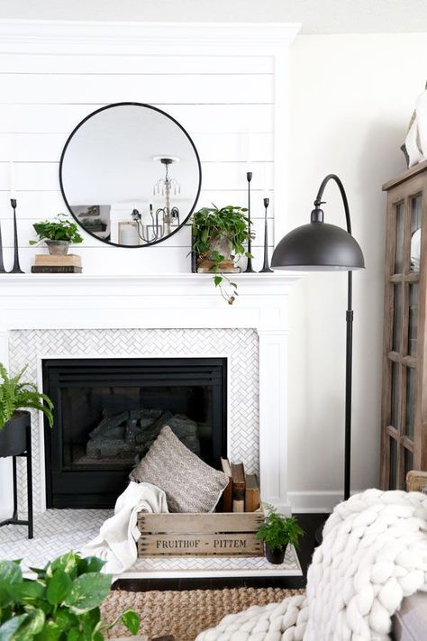 Black Swing arm lamp and a modern farmhouse fireplace. Spring Living Room Update with HomeGoods- Modern Farmhouse Living Room by Plum Pretty Decor Design Co. Farmhouse Fireplace Ideas, Modern Farmhouse Fireplace, Spring Living Room, Fireplace Mantle Decor, Modern Farmhouse Living, Farmhouse Fireplace, White Fireplace, Living Room Update, Modern Farmhouse Design