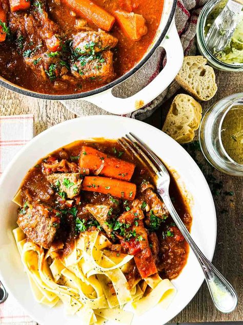 Patricia Wells' recipe for Beef Daube is a bright beef stew braised with white wine, onions, tomatoes, and herbs. Beef Daube, French Beef Stew, Easy Beef Stew Recipe, Canned Plums, Best Dutch Oven, The View From Great Island, Easy Beef Stew, Irish Stew, Classic French Dishes