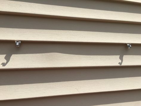 How To Hang Signs On Vinyl Siding, How To Hang Wood Shutters On Vinyl Siding, How To Hang House Numbers On Vinyl Siding, How To Hang Shutters On Vinyl Siding, Salt Wash Paint Furniture, Deck Oasis, Outdoor Siding, Hang Plants, Concrete Siding