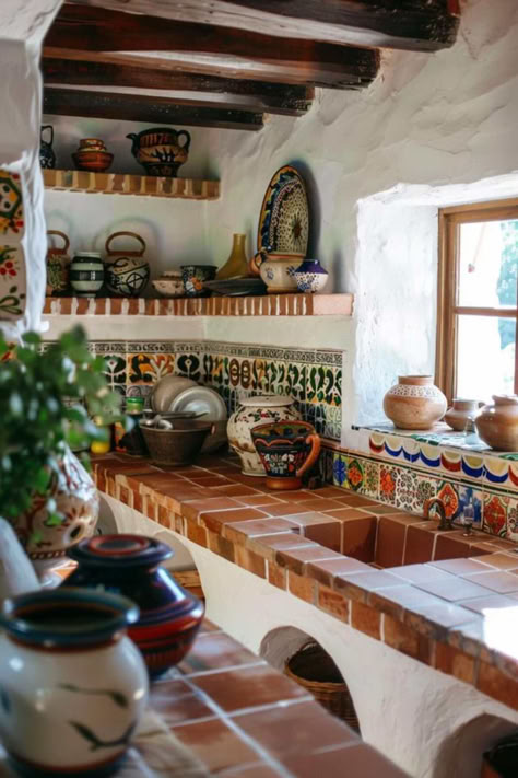 40 Kitchen Counter Decor Ideas for a Beautiful and Functional Home Spanish Countertops, Pueblo Kitchen Design, Terra Cotta Tile Countertops, Cob Kitchen Ideas, Small Mexican Kitchen Ideas, Italian Kitchens Modern, Country Italian Kitchen, Oaxacan Home Decor, Small Hacienda Kitchen