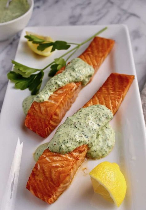 Roasted Salmon with 'Greens' Mustard Sauce, marinated salmon, roasted and then topped with a creamy "greens" mustard sauce made with spinach and arugula. #thehungrybluebird #roastedsalmon #salmonrecipes #seafoodrecipes #mustardsauce #easydinner Yogurt Sauce For Salmon, Leftover Chili Recipes, Seafood Main Course, Salmon Roasted, Mustard Sauce Recipe, Orange Juice Recipes, Seared Salmon Recipes, Creamy Mustard Sauce, Sauce For Salmon