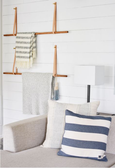 Modern Blanket Ladder Made from Wooden Dowels and Leather straps attached to the Wall Blanket Ladder Modern, Modern Quilt Rack, How To Display A Blanket On The Wall, Blanket Ladder Attached To Wall, Towel Storage On Wall, Blanket Ladder On Wall, Blanket Storage Living Room Wall, Wall Blanket Ladder, Blanket Storage Wall