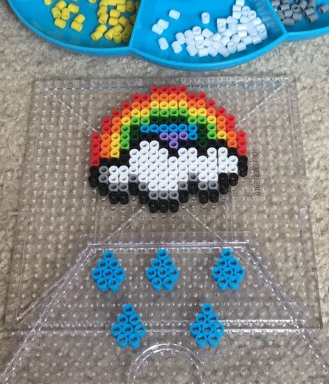 Perler Beads Rainbow & Raindrops Rainbow Perler Beads, Perler Bead Rainbow, Perler Accessories, Rainbow Raindrops, Rainbow Loom Designs, Easy Perler Bead Patterns, Pearl Beads Pattern, Easy Perler Beads Ideas, Fuse Bead Patterns