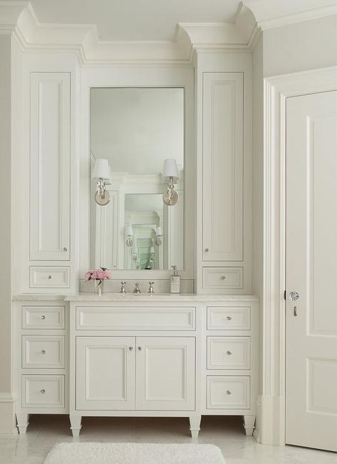 Thomas O'Brien Jonathan Sconces mount on a vanity mirror flanked by built-in cabinets over an ivory French style washstand with feet. Kitchen French, French Country Bathroom, French Country Bedrooms, Vanity Ideas, Country Bathroom, Master Bath Remodel, Bath Cabinets, Home Luxury, Upstairs Bathrooms