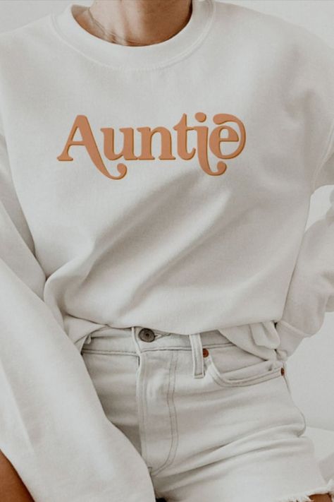 TRIXIE Retro 70's Themed Orange Groovy Auntie Sweatshirt This auntie sweatshirt features an orange retro 70's themed font and simple design. This pull over makes the perfect gift to announce a new baby or for the cool aunt in your life. Colors are editable! Click 'edit design' to change the colors. The Cool Aunt, Cool Aunt, Orange Retro, Retro 70s, The Cool, New Baby, Funny Shirts, Simple Design, Simple Designs