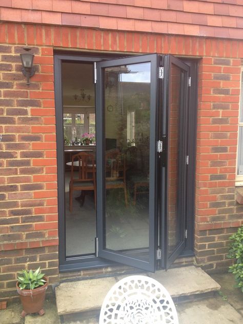 Folding French Doors Patio, Folding Door Exterior, Small Patio Doors Ideas, Balcony Folding Door, Small Patio Doors, Small Bifold Doors Onto Patio, Kitchen Doors To Outside, Bi Fold Patio Doors, Folding Door Makeover