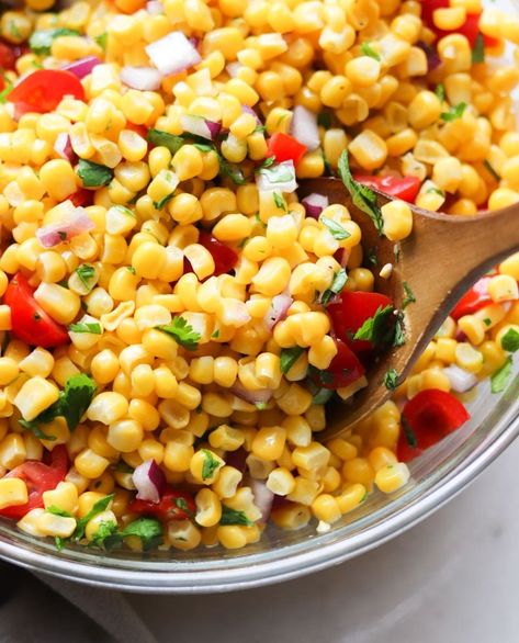 Easy and flavorful copycat Chipotle Corn Salsa recipe, made in just a few minutes with a handful of simple ingredients. You won't believe how easy this recipe is with either frozen or canned corn, plus you can make it well ahead of time to serve at your next backyard bbq or get together! Serve it with tacos, fajitas, or tortilla chips for dipping! #cookathomemom #glutenfree #cornsalsa Chipotle Copycat Corn, Chipotle Corn Salsa Recipe Copycat, Chipotle Barbacoa Recipe, Canned Corn Recipes, Chipotle Corn Salsa, Chipotle Corn, Chipotle Copycat, Copycat Chipotle, Barbacoa Recipe