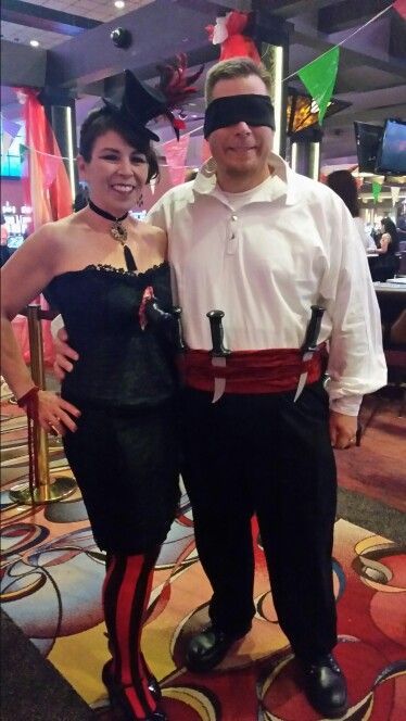 Unique couples costume. The blindfolded knife thrower and his lovely assistant.  Halloween 2014. Love my steampunk hat! Knife Thrower Costume, Team Themes, Vegas Halloween, Unique Couples Costumes, Knife Thrower, Circus Decor, Circus Freaks, Circus Costumes, Team Theme