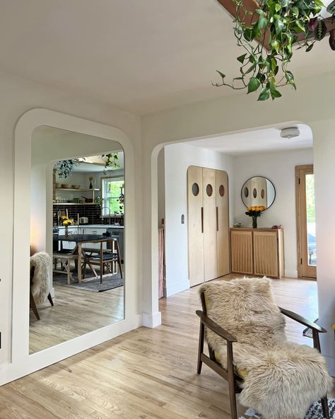 white entry way with curved doorways and skylight Modern Cased Opening, Diy Arched Mirror, Long Hallway Entryway, Diy Skylight, Organic Modern Home, Fixer Upper Home, Living Room Transformation, Basement Apartment, Kitchen Backsplash Designs