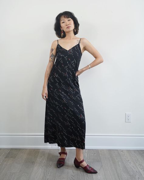 Available for Story Exchange only: Thrifted Spaghetti Straps Black slip dress with Floral illustrations, bias cut, raw hem. 100% polyester, Marked XS. Measurements// Chest/ Wasit:34” Length: 49” (adjustable straps) #ClothesForHearts #thriftedstyle #secondhandclothing #preloved #sustainablefashion #slipdress #torontovintage #vintagestyling #clothingswap Clothing Swap, Black Slip Dress, Floral Illustrations, Second Hand Clothes, Sustainable Fashion, Spaghetti Strap, Adjustable Straps, Slip Dress, Spaghetti