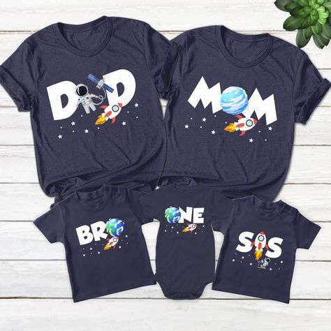 Unisex Birthday Party Themes For Adults, Rocket First Birthday Party, Space Smash Cake 1st Birthdays, Space Theme First Birthday Party, Birthday Party Space Theme, Space Themed First Birthday Party, First Birthday Family Shirts, Birthday Party Space, Space Theme Birthday Party