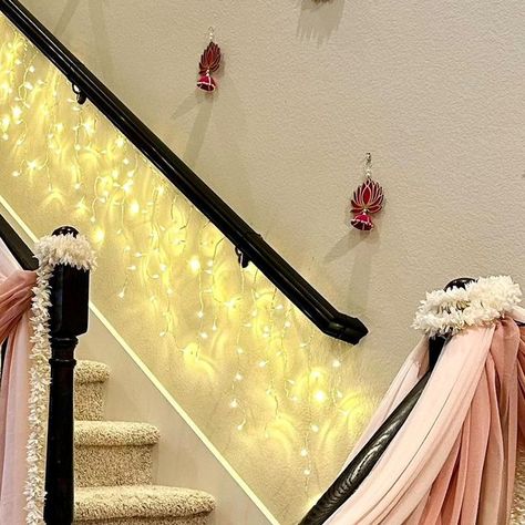 Himani Singh on Instagram: "🪔 Diwali decor series 🪔 After a blingy Diwali last year, decided to go with subtle pinks and white this year and so in love with how the entire house looks 🩷 Also glad to be done with all the cleaning and decor a week early so we can actually enjoy a decorated house this whole week and have a stress-free Diwali 🥰 Products sources: Saree: @hastavem Diya & lotus cutout danglers, lotus garlands and elephant stools from @shubbh__laabh Drapes: @amazon . . . . Please do not repost! . #diwali #diwalidecor #diwali2023 #diwaliinusa #homedecorideas #festivedecor #indiandecor #diwalidecoration #indianfestivaldecor #southasianblogger" Lotus Cutout, Diwali Decorations At Home, Diwali Decor, Indian Decor, Diwali Decorations, Indian Festivals, So In Love, Festival Decorations, Diwali