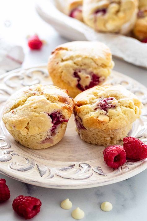 These raspberry and white chocolate muffins are easy to make and bursting with raspberry and white chocolate flavor. They are light, moist, delicious, and freezer friendly. Enjoy them for breakfast, brunch, or dessert! Get the easy recipe at Heavenly Home Cooking. Raspberry And White Chocolate Muffins, Raspberry And White Chocolate, White Chocolate Muffins, Peach Muffins, Jumbo Muffins, Strawberry Muffins, Yeast Breads, Quick Breads, Chocolate Muffins