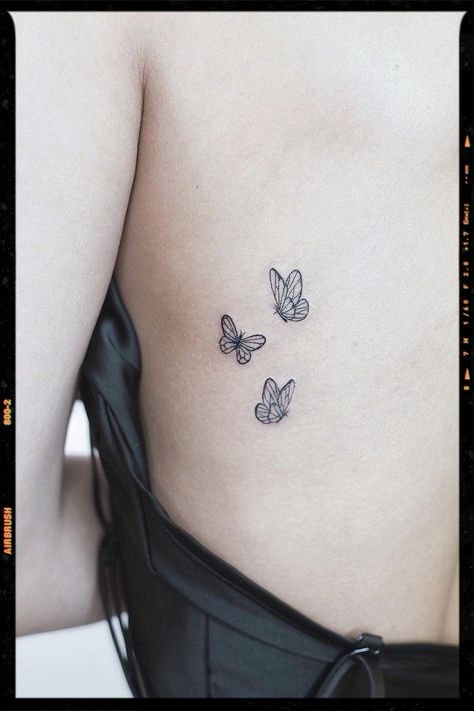 Butterfly Tattoos Inspiration Ctrl Butterfly Tattoo, Mid Back Butterfly Tattoo, Tattoo Ideas On Wrist, Three Butterflies Tattoo, Flying Butterfly Tattoo, Brown Tattoo Ink, Back Tattoos Spine, Butterfly Neck Tattoo, Monarch Butterfly Tattoo