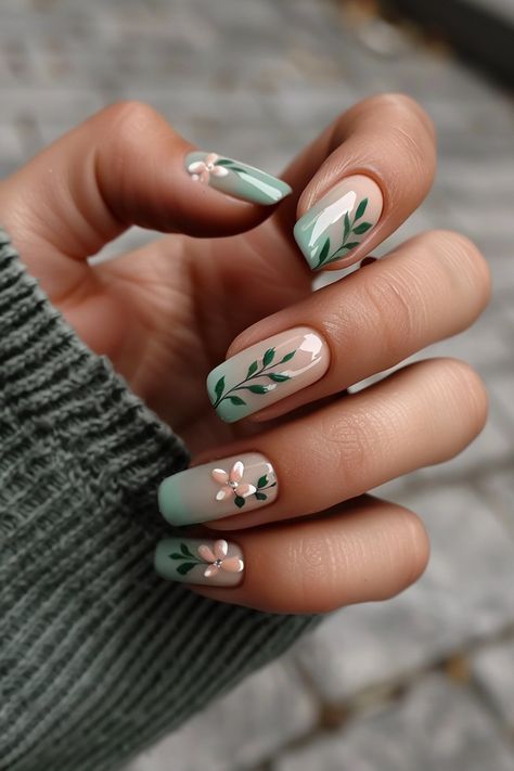 In need of green nail inspo for your next mani? Look no further than our blog post featuring 42 gorgeous ideas! You'll find pretty designs like the mint green ombre nails you see here, plus styles with minimalist nail art, modern geometric designs, and more. Check out the blog post now or save this pin for later! Green Accent Nail Ideas, Nature Color Nails, Green Leaf Nail Designs, Fun Green Nail Designs, Gel Nails Ideas Green, Simple Green Nail Designs, Plant Nails Design, Prom Nail Inspiration, Nail Art Designs Coffin