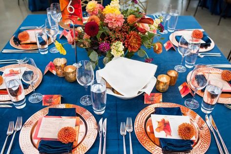 Navy Blue Mustard Yellow Burnt Orange, Orange And Blue Table Setting, Blue And Orange Table Setting, Blue And Burnt Orange Wedding, Wedding Colors For 2023, Burnt Orange Fall Wedding, Yellow Wedding Centerpieces, Orange Fall Wedding, October Wedding Colors