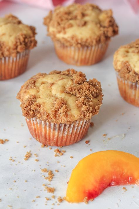 Facebook0Tweet0Pin0Yummly0 Peach cobbler muffins! Sweet, buttery and soft, and loaded with delicious cinnamon brown sugar streusel. Everything you love about peach cobbler, in super easy muffin form. Extra bonus? They’re so easy to make! Almost a one bowl recipe, if you don’t count the streusel! Cobblers have a special place in my heart. As a kid we would help my mom pick buckets and buckets of fresh berries from the woods down the street from our house, and would dream the whole time of the cob Peach Cobbler Muffins Easy, Peach Muffins With Canned Peaches, Easy Peach Muffin Recipes, Folks Peach Muffin Recipe, Just Peachy Peach Muffins, Cobbler Muffins, Peach Cobbler Muffins, Peach Muffins, Peach Puree