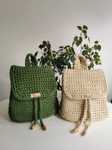 Crochet backpack with push handle, very comfortable and quite roomy ;)  Color in these photos are  light green (number 116 in my pallet ) and cream ( number 33 in my pallet) . Handmade to order, production takes two-three working days. The shade of the product may differ slightly from what is seen in the photo, and color mismatch may occur due to different lighting conditions during shooting and the resolution settings of your screen. Each handbag is made individually, so slight deviations from Bag Product Shoot, Crochet Rucksack, Crochet Mini Backpack, Crocheted Backpack, Backpack Crochet, Wool Crafts Diy, Crochet Mignon, Crochet Backpack, Bag Pattern Free