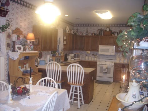 Grandmas House Nostalgia, Grandma Core House, Microwave Hutch, House Nostalgia, Grandma House, Bakers Rack, Suburban House, Metal Basket, Liminal Spaces