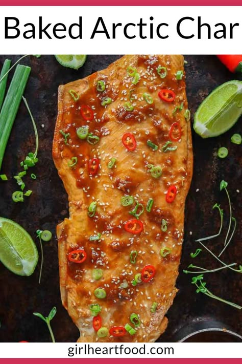 This baked arctic char recipe is easy to prepare and so delicious! Arctic char has a honey soy marinade and garnished with sesame seeds, green onion, chili pepper, and a squeeze of lime. #arcticchar #arcticcharr #bakedarcticchar #arcticcharrecipe #honeysoymarinade #seafooddinner #sheetpandinner #fishdinner #easyfishrecipe #easyseafoodrecipe Arctic Char Fish, Arctic Char Recipes, Artic Char Fish Recipes, Arctic Charr Recipes, Artic Char Recipes, Char Recipes, Honey Soy Marinade, Lenten Meals, Baked Trout