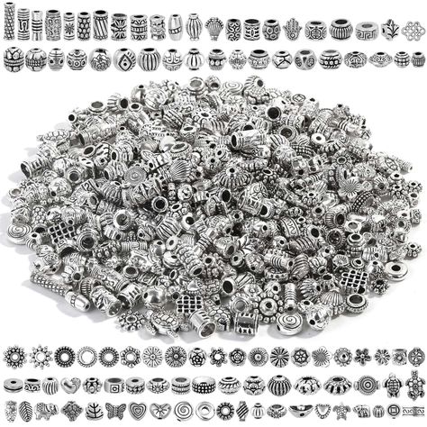 PRICES MAY VARY. 【500Pcs Spacer Beads for Bracelet】The silver spacer beads bulk come with 500 pcs metal jewelry spacer beads in different sizes and shapes, sufficient quantity of spacer beads can meet your different needs for jewelry making. Note: All the spacers are random style 【Various Styles Spacer Beads】There are over 50 different designs of spacer beads for bracelet making include flat, round, balls, cylindrical shape spacer beads, flowers, hearts, leaves, turtles, owls, etc. Classic eleme Apply Concealer, Random Style, Diy Jewelry Accessories, Gifting Ideas, Earring Making, Bracelet Charms, Jewelry Making Charms, Accessories Diy Jewelry, Diy Schmuck