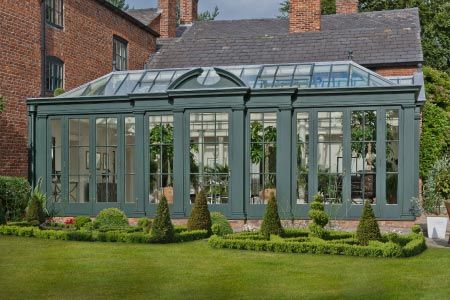 Georgian orangery in Cheshire is designed with broken segmental pediment Greenhouse Colors, Georgian Orangery, Edwardian Conservatory, Kitchen Orangery, Orangery Conservatory, Victorian Conservatory, Orangery Extension, Conservatory Kitchen, Garden Houses