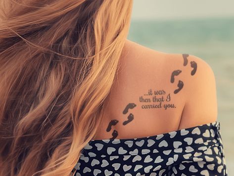 6 Jesus Tattoo Designs For Women | Popular Christian Tattoos - Beliefnet Footprints In The Sand Tattoo, Jesus Tattoo Design, Biblical Tattoos, Tattoo Quotes About Life, Back Of Shoulder Tattoo, Jesus Tattoo, Shoulder Tattoos For Women, Small Tattoos For Guys, Tattoo Videos