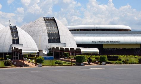 Bujumbura International Airport is the main and only international airport which also has the only paved runway within the capital city of the Republic of Burundi, Bujumbura. Nestled in between the mountains that are spreading between the Republic of Burundi and the Democratic Republic of the Congo, it is some 10 km (6 mi) outside Bujumbura, on the shores of the Lake Tanganyika. At an elevation of 787 meters (2,582 feet) above sea level, the airport's runway is 3,600 meters (11,811 feet... Africa Cities, Lake Tanganyika, Round Building, Rift Valley, Landlocked Country, Money Pictures, Maputo, Key Visual, Addis Ababa