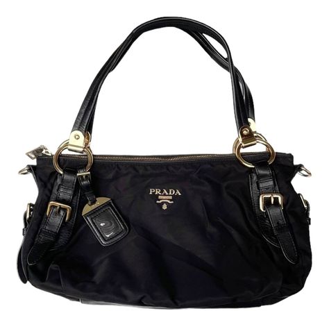 Prada Vintage - Nylon Satchel Bag Black  Good Conditions : 8/10 Made In Italy GHW This satchel features a nylon body with leather trim, rolled leather handles with belt details, a top zip closure, and interior zip and slip pockets. Measurements : Width : 14.5 inches Height : 9 inches Depth : 6.5 inches Hand Drop : 9 inches  Strap adjust  PLEASE CHECK ACTUAL SIZE CAREFULLY, NO RETURNS OR COMPLAIN FOR WRONG SIZE ACTUAL  *Shipping using Express Mail Service "will take 4 - 7 working day to arrived a Prada Bags Aesthetic, Old Money Handbags, Prada Vintage Bag, Vintage Prada Bag, Shoulder Bags Outfit, Prada Purse, Prada Vintage, Prada Purses, Vintage Prada