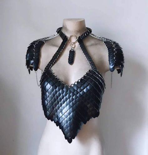 This piece is a one of kind item made by Synthetic Daisy designs.  Constructed out of a combination of scalemail pieces with bright aluminum chainmail. Shoulder pauldrons clip on & off.  Has a built in necklace.                                                        Check out my website for more items exclusively sold only there. www.syntheticdaisydesign.com Metal Breastplate Female, Dragon Scale Armor Female, Armor For Women, Scalemail Armor, Dragon Scale Armor, Chainmail Clothing, Futuristic Costume, Chainmail Patterns, Scale Mail