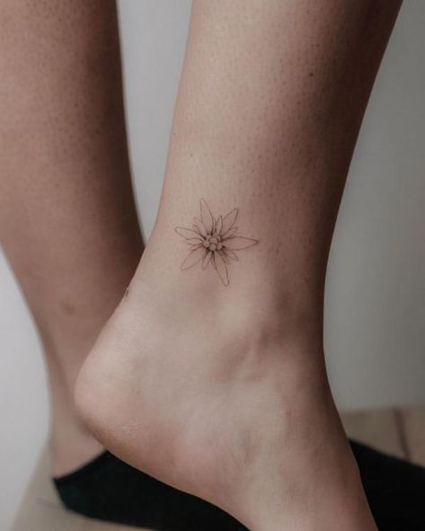 Edelweiss Tattoo: A Symbol of Beauty and Resilience | Art and Design Edelweiss Tattoo, Resilience Art, Resilience Tattoo, Darkside Tattoo, Germany Tattoo, Country Tattoos, Tattoo Spots, Flower Tattoo Drawings, Edelweiss Flower