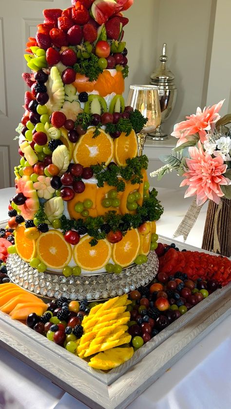 Marilyn brings a "fruit" cake centerpiece Wedding Fruit Cake, Fruit Tables, Wedding Fruit, Edible Fruit Arrangements, Pineapple Cupcakes, Fruit Table, Fresh Fruit Cake, Cake Centerpieces, Fruit Platter Designs