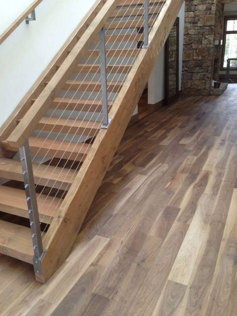 warmcolored wood staircase and wood and cable railing to give it a fresher modern look Stair Railing Interior, Privacy Deck, Deck Cable Railing, Cable Stair Railing, Stair Railing Ideas, Rustic Deck, Best Flooring For Basement, Loft Railing, White Deck