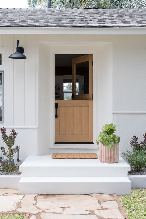 This Airy Reno Got a Last-Minute Dose of Drama in the Kitchen Exterior Wood Trim, Red Kitchen Cabinets, Dutch Doors, California Bungalow, Bungalow Renovation, Amber Lewis, Bungalow Design, Dutch Door, Front Porches