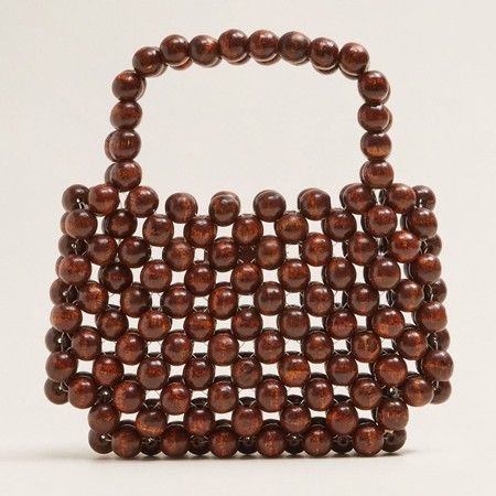 15 Beaded Bags To Buy | sheerluxe.com Trending Handbags, Wooden Bag, Bohemian Bags, Crystal Bags, Wicker Bags, Pearl Bag, Handbag Pattern, Rattan Bag, Beaded Bag