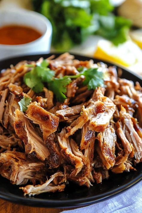 The Juicy, Flavorful Carnitas (Mexican Slow Cooker Pulled Pork) Recipe That’ll Have Your Friends Envying Your Crockpot Skills - Carnitas Mexican Pulled Pork pin Pork Shoulder Carnitas Crockpot, Carnitas Meal Ideas, Carnitas Dutch Oven, Crockpot Carnitas Recipes, Crockpot Pork Shoulder, Mexican Pork Chops, Carnitas Recipes, Carnitas Slow Cooker, Cooking Pork Shoulder