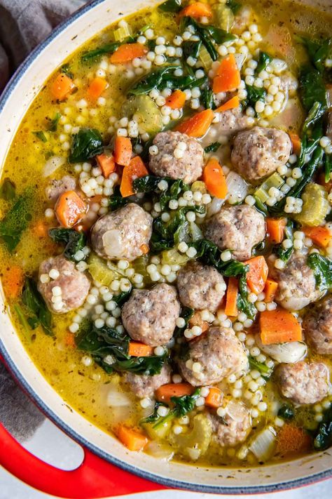 The best Italian Wedding Soup with homemade meatballs. This easy recipe makes a healthy, comforting soup that's filled with vegetables, sausage and turkey meatballs and pasta. You're going to love it! Turkey Meatball Soup, Wedding Soup Recipe, Tiny Pasta, Italian Wedding Soup Recipe, Meatball Soup Recipes, Comfort Soup Recipes, Comforting Soup, Healthy Italian, Wedding Soup