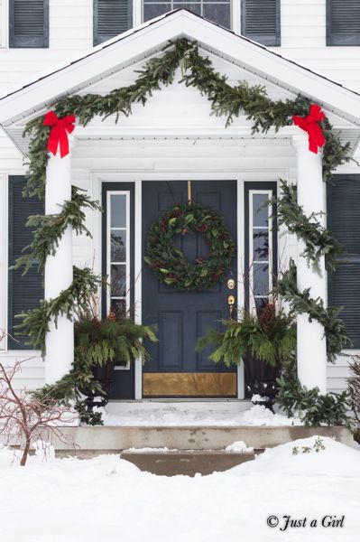 Christmas Garland Columns, Christmas Porch Decor Columns, Front Porch Christmas Columns, Christmas Decor Porch Columns, Front Porch Christmas Decor Columns, Christmas Portico Decor, Christmas Front Porch With Columns, Christmas Decor Columns Outside, Portico Christmas Decorations