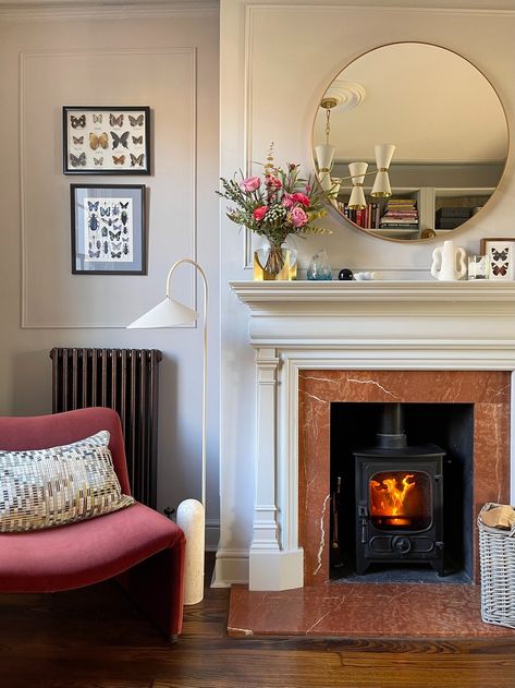 10 Of The Best Round And Irregular-Shaped Wall Mirrors — MELANIE LISSACK INTERIORS Cozy Living Room With Fireplace, Fireplace Mantel Decorating Ideas, Colour Drenching, Color Drenching, Warm Neutral Paint Colors, Mantel Decorating Ideas, Warm Paint Colors, Courtyard Ideas, Sitting Room Decor