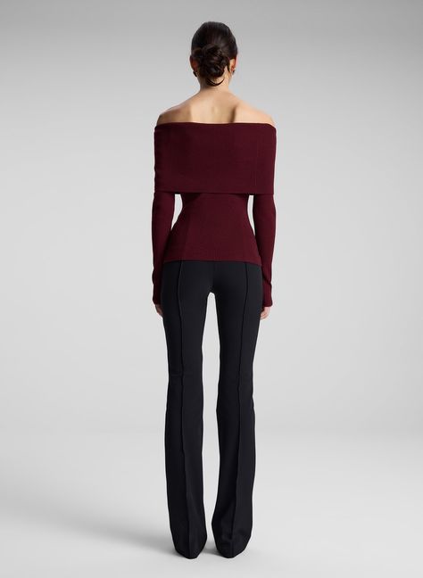 The Evelyn Top is crafted from stretch merino wool in a burgundy hue. This off-the-shoulder silhouette features a wide foldover detail that hits at the elbows and knuckle-grazing sleeves. Shop Tops, Styling Tip: Layer over a fluid skirt and slingback heels for an evening out. Casual And Professional Outfits, Christmas Clothes For Women, Cute Office Clothes, Petite Elegant Style, Chic Fall Tops, Wine Red Clothes, Classy Casual Style, Banquet Outfits, Christmas Eve Outfits